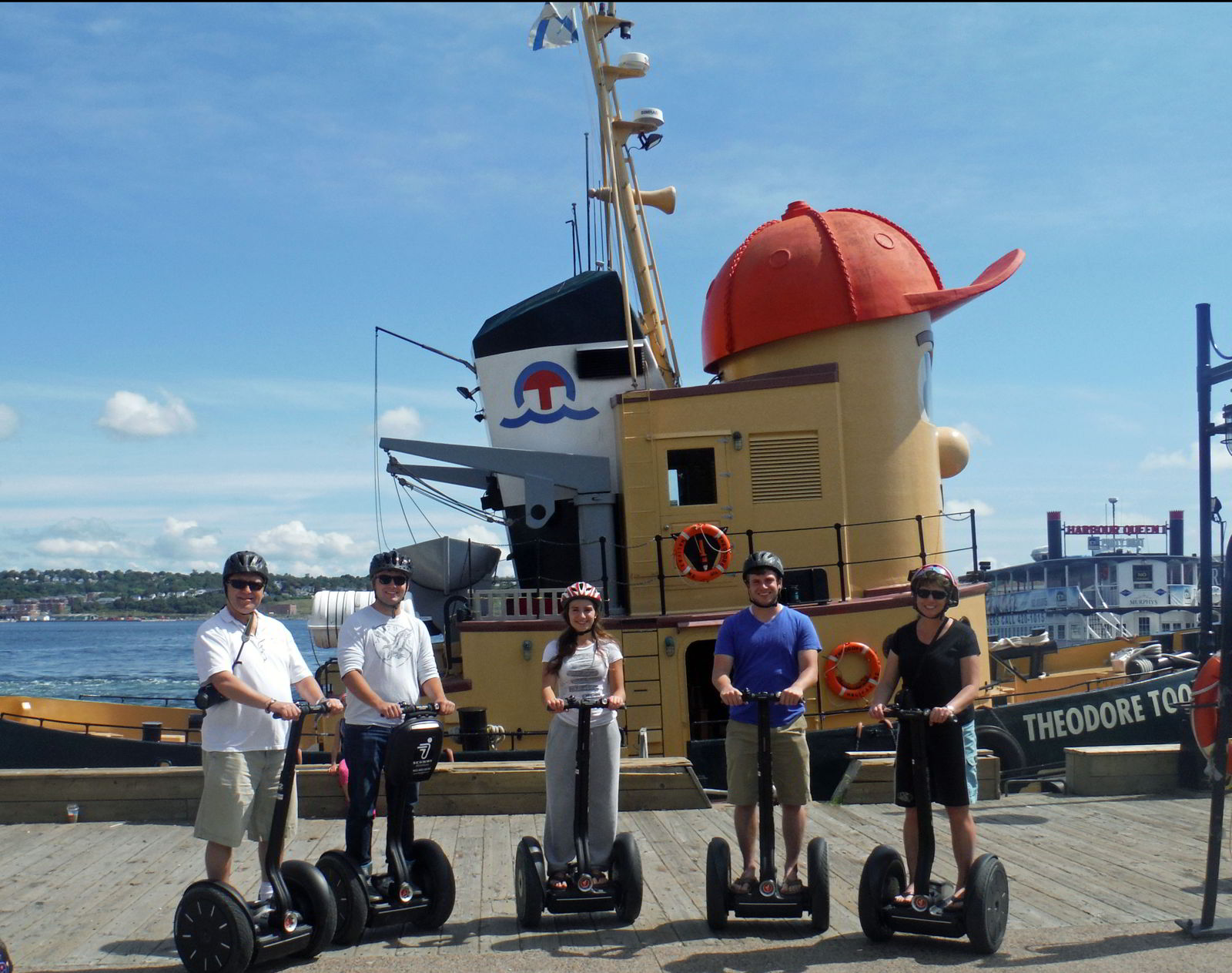 An image of a family on a Segway tour of the Halifax harbor in Halifax, Nova Scotia Canada - Halifax tours