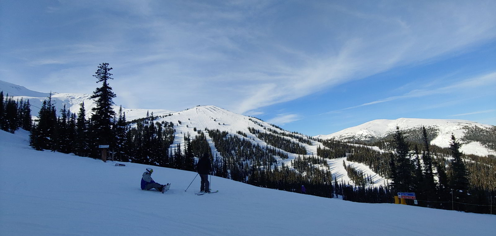 An image of two skiers at the top of Marmot Basin ski resort in Jasper, Alberta - Jasper Skiing