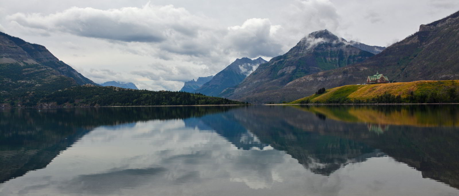 An image of the Prince of Wales Hotel and the surrounding scenery in Waterton Lakes National Park, Alberta Canada