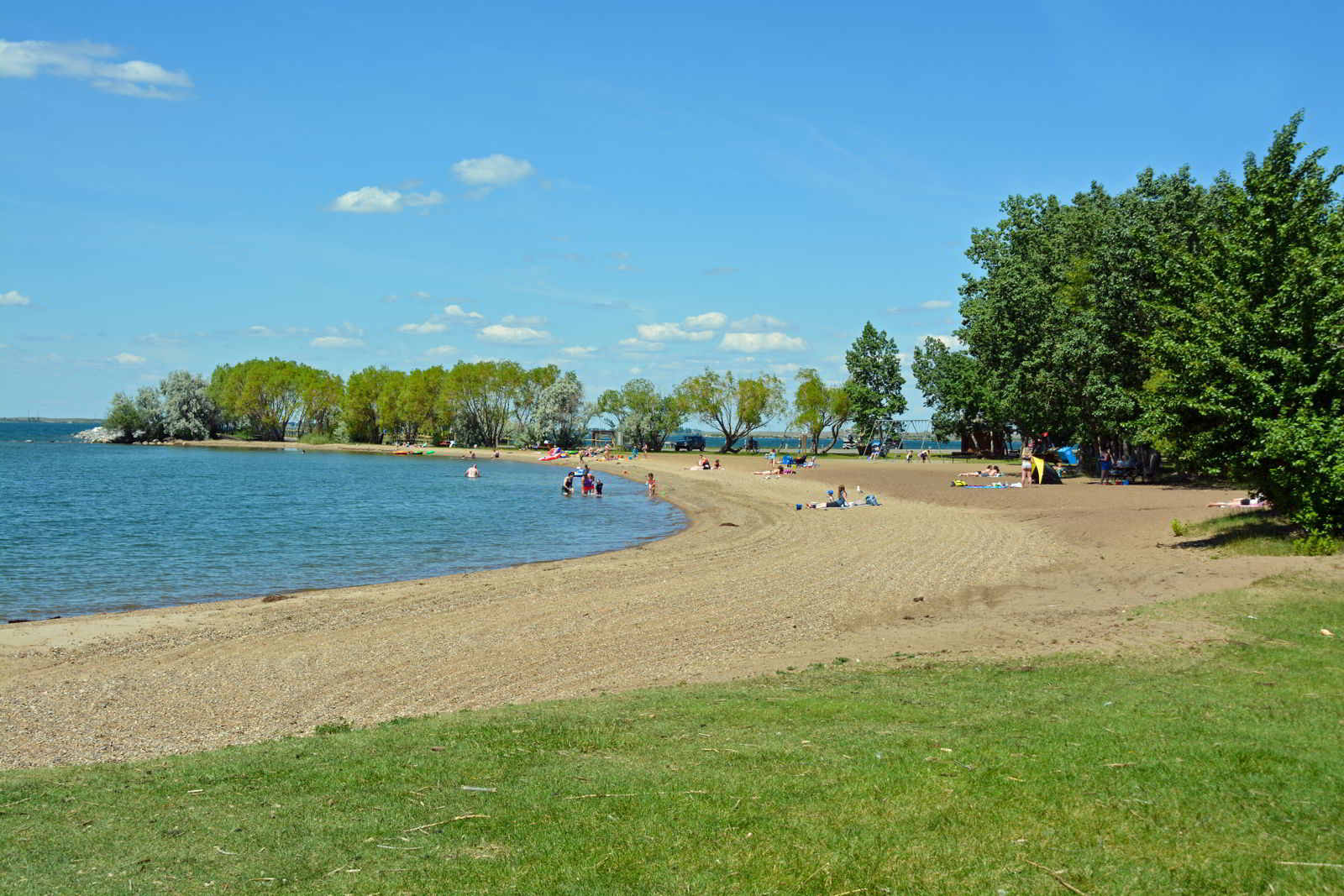An image of the sandy shores of Lake Newell at Kinbrook Island Provincial Park near Brooks, Alberta.