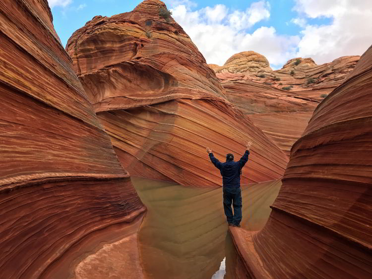 An image of a man hiking the wave in Arizona, USA. 