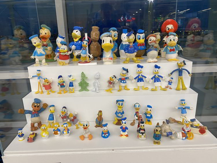 An image of a Donald Duck collection on display at Vancouver Airport. 