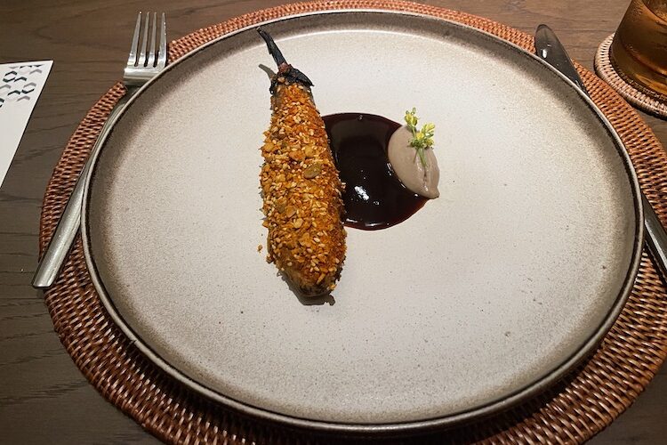 A fine dining dish at Jampa restaurant in Phuket, Thailand. Farm eggplant. 