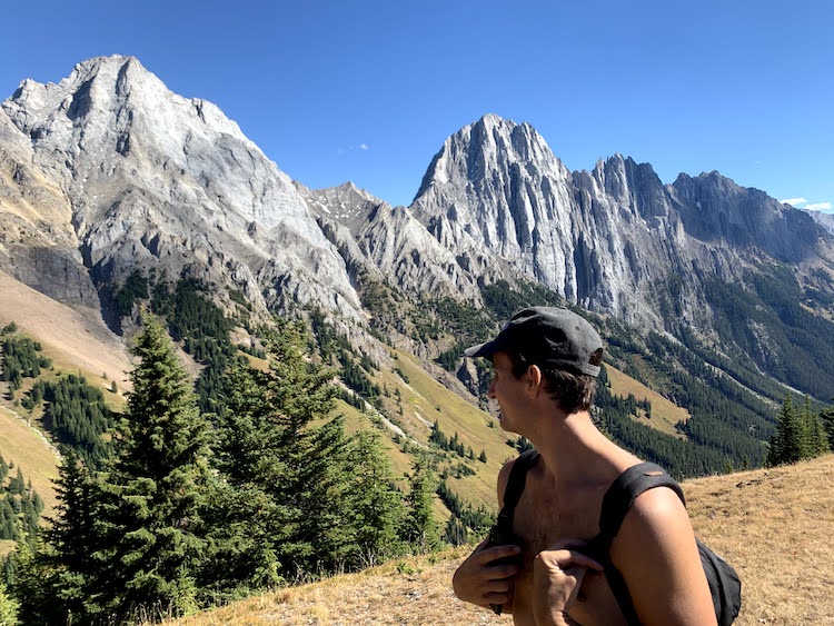 A man looking at the mountains on Kind Creek Ridge Trail.