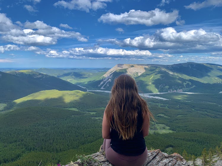 A girl admiring the view on Nihahi Ridge trail.