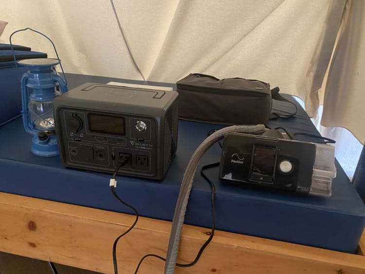 An image of a Bluetti power source connected to a CPAP machine. 