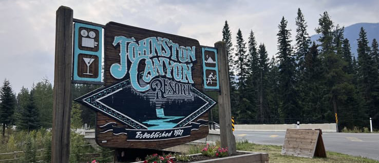 An image of the sign for Johnston Canyon Resort in Banff, Alberta, Canada.
