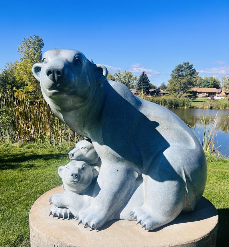 An image of Shelter Cove sculpture by Mary Régat at the Benson Sculpture Garden in Loveland, Colorado. 