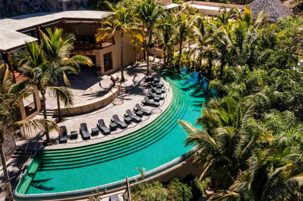 An image of a resort pool at Delta Hotels Riviera Nayarit.